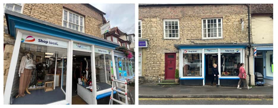 An image of the Shop Local signage along a white trim storefront.